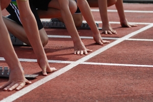 Groeisprint Afbeelding van sprinters aan de start van de race.